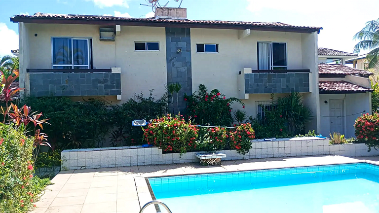 Kitnet com Piscina e Churrasqueira Compartilhadas