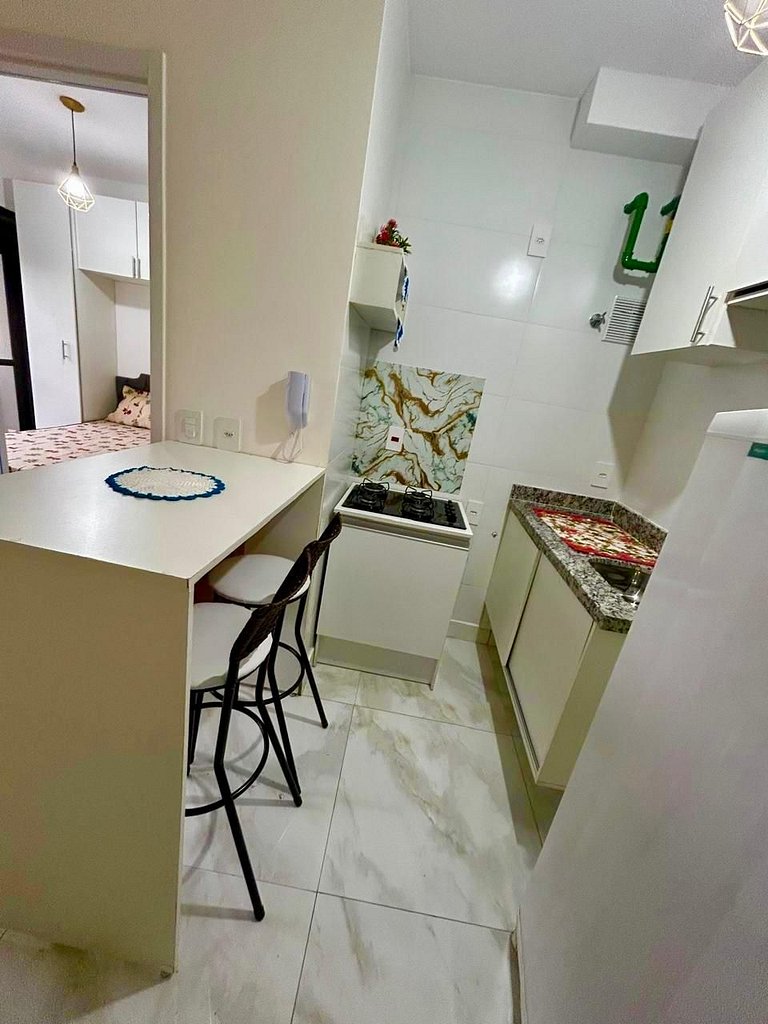 Apartamento com Piscina e Academia Compartilhados