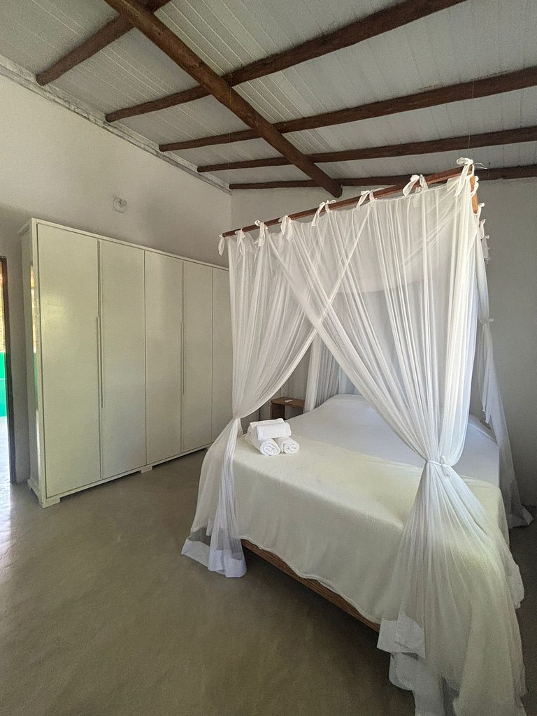 Refúgio em Caraíva: Ar Condicionado e Piscina